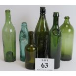 Six mixed glass bottles including one with an applied seal, a Codd bottle and Style & Winch
