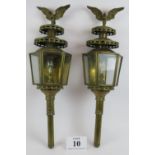 A large pair of converted brass carriage lamps in the imperial style each with eagle surmounts and