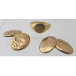 An 18ct gold signet ring, size N and a pair of 9ct gold cufflinks. Total approx weight 6.9 grams.