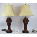 A pair of large contemporary Chinoiserie style octagonal baluster lamps with shades richly decorated