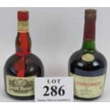 One bottle of Courvoisier 3 star cognac, 68cl and one bottle of Grand Marnier liqueur, 70cl, both