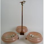 A period Art Deco three branch ceiling light in polished copper with pink glass shades. Overall