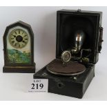 A vintage Decca Junior gramophone and a French mantel clock with printed dial. (2). Condition