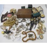 An assortment of various items mainly vintage jewellery and wristwatches to include a silver cased