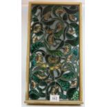 A large Arts and Crafts stained glass window panel in the style of William Morris featuring stylised