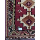 A good Qashqai Kilim rug. 1.65 x 1.32. In good condition and colours are vibrant.