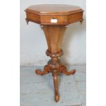A Victorian cone shaped burr walnut & fruitwood work table the hinged top opening to reveal 8 lidded