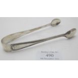 A pair of silver sugar tongs with bead edge decoration, Sheffield 1913, approx weight 1.5 troy oz/49