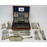 An antique wooden canteen of 12 silver plated fish knives and forks, a set of fish servers, a