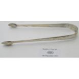 A pair of Irish silver sugar tongs, indistinct Dublin marks, engraved wings crest, approx weight 1