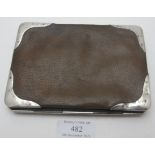 A silver mounted leather wallet, London 1903, Drew & Co, 156 Leadenhall St E.L. Condition report: