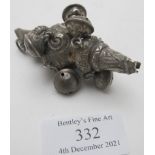A baby's silver rattle/whistle with embossed decoration and seven bells, Birmingham 1891, approx