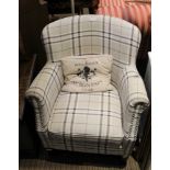A MODERN UPHOLSTERED LOW BACKED CHAIR in Burberry style check