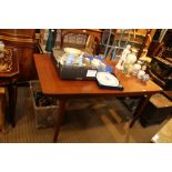 A MACINTOSH BRANDED TEAK EXTENDING DINING TABLE