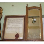 A SMALL BEVEL PLATE WOODEN FRAMED WALL MIRROR, together with a glazed and framed Religious document