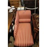 A MODERN REGENCY STRIPED UPHOLSTERED SMALL SIZED CHAISE LONGUE with bolster cushion