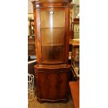 A WELL MADE REPRODUCTION YEW WOOD SERPENTINE FRONTED CORNER UNIT the upper section glazed