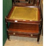 A REPRODUCTION MAHOGANY FINISHED METAMORPHIC GAMES TABLE having skiver lid, checkerboard lid, back