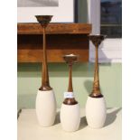 THREE MODERNIST FREESTANDING TEALIGHT CANDLESTICKS