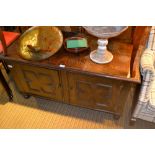 AN OAK FINISHED BOX COFFER having two door front (rather than traditional lift-up lid)