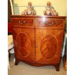 A GOOD QUALITY ANTIQUE DESIGN BOW FRONT TWO DOOR AV STORAGE CABINET