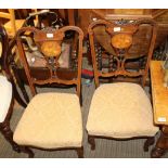 A PAIR OF FANCY INLAID BACKED LOW CHAIRS with overstuffed seat pads, on cabriole fore legs and plain