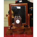 A SMALL MAHOGANY FRAMED DRESSING TABLE TOPPED MIRROR, together with a wooden watch stand, with a