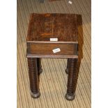 A SMALL OAK SQUARE TOPPED STOOL on fancy bobbin decorated legs