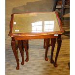 A MODERN NEST OF THREE TABLES with gilt tooled green skiver insert tops