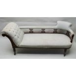 A LATE 19TH / EARLY 20TH CENTURY SHOW WOOD FRAMED CHAISE LONGUE with buttoned reclining side,