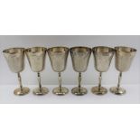 CHARLES S. GREEN & CO. LTD A SET OF SIX SILVER GOBLETS, engraved borders to the partially matted