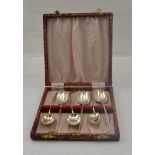 A MATCHED SET OF SIX SILVER GOLF CLUB HANDLED TEASPOONS, five by Walker & Hall, three 1923, one