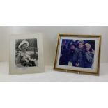 A FRAMED SIGNED PHOTOGRAPH OF CHRISTOPHER JUDGE MICHAEL SHANKS and Amanda Topping from the