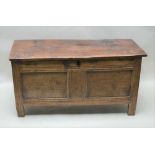 A PART 18TH CENTURY PLAIN PANELLED OAK BOX COFFER, of typical form and construction 59cm x 112cm