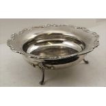 COOPER BROTHERS & SONS LTD A SILVER FRUIT BOWL with acanthus leaf rim, raised on three decorative