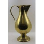 A 'JONES & WILLIS' BRASS EWER JUG in the Gothic Revival taste, scroll handle with trefoil