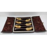 THOMAS CHAWNER A SET OF SIX GEORGE III SILVER TABLE SPOONS, Onslow pattern, with gilded bowls,