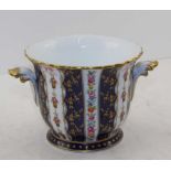 A 20TH CENTURY PORCELAIN CACHE POT painted in the Crown Derby style, with mock Sevres mark under the