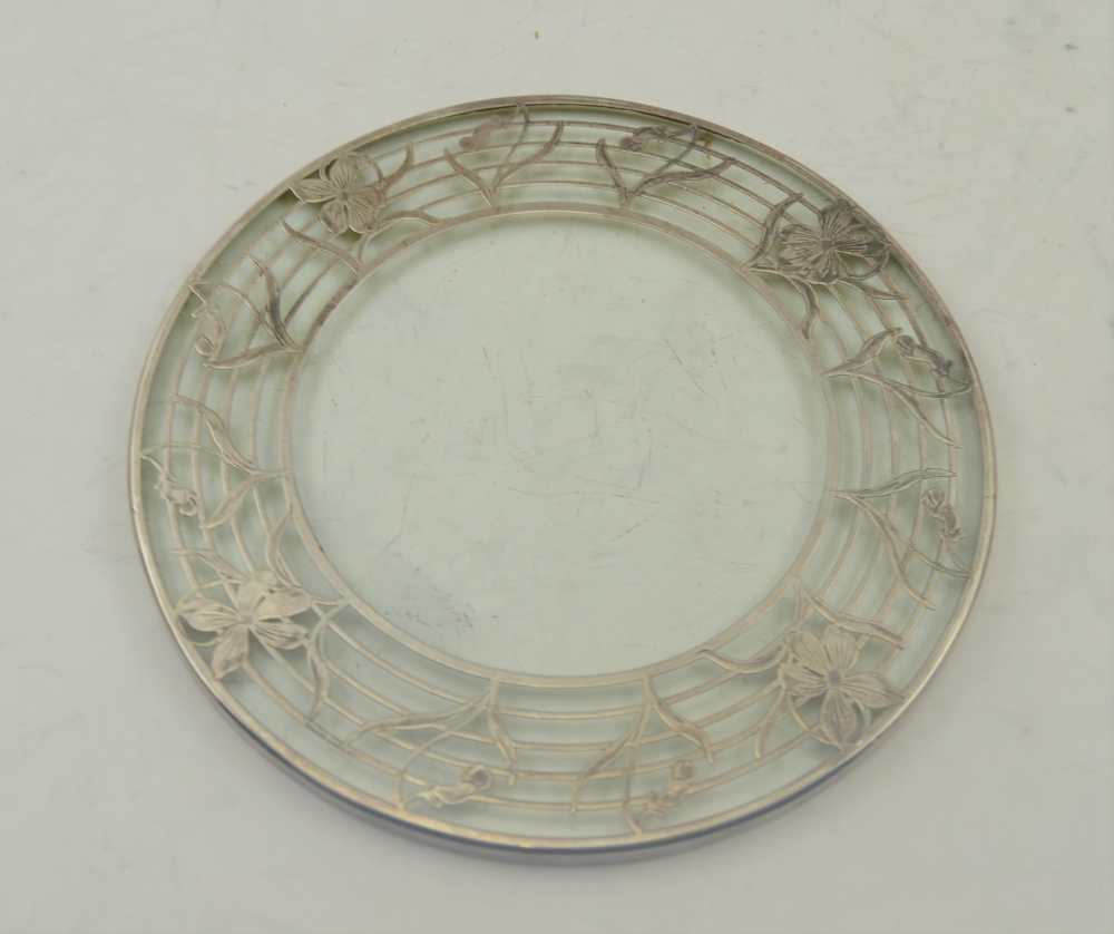 A SILVER OVERLAID GLASS TEAPOT STAND, Art Nouveau, iris decoration, 17.5cm in diameter