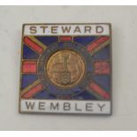 AN ENGLAND 1966 FOOTBALL WORLD CUP 'STEWARD WEMBLEY' ENAMELLED BADGE, an image of the Union Jack