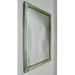 A 20TH CENTURY WALL MIRROR with bevelled green mirror glass frame, overall size, 76cm x 53cm