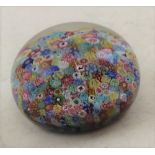 A BACCARAT MILLEFIORI PAPERWEIGHT, limited edition with silhouettes and date set in the cone tops,