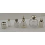 A SILVER MOUNTED FACET CUT GLASS GRENADE FORM SCENT BOTTLE, Birmingham 1939, 12cm high, together