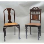 A LATE VICTORIAN SCROLL CREST HALL CHAIR with panelled seat together with a cane seated single