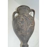 A THRACIAN BLACKWARE CLAY AMPHORA, of classical form with two handles and moulded decoration of a