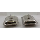 A PAIR OF EARLY 20TH CENTURY SILVER-PLATED ENTREE DISHES of cushion form, by Mappin & Webb, 28cm x