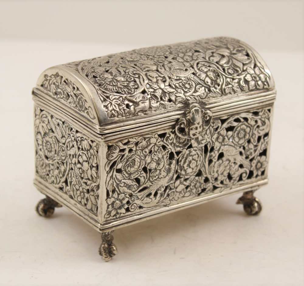 A DUTCH SILVER TABLE CASKET, domed hinged cover, cast, pierced design with birds and flowers, a mask