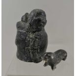 AN INUIT DESIGN FIGURE, mother and child made by Wolf Enterprises 10.5cm high, together with a