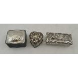 WILLIAM COMYNS AN EMBOSSED SILVER HEART SHAPED TRINKET BOX, London 1892, together with a glass