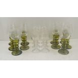 TWO SETS OF ETCHED BOWL ROEMERS, a set of six with clear glass stems and a set of ten with green